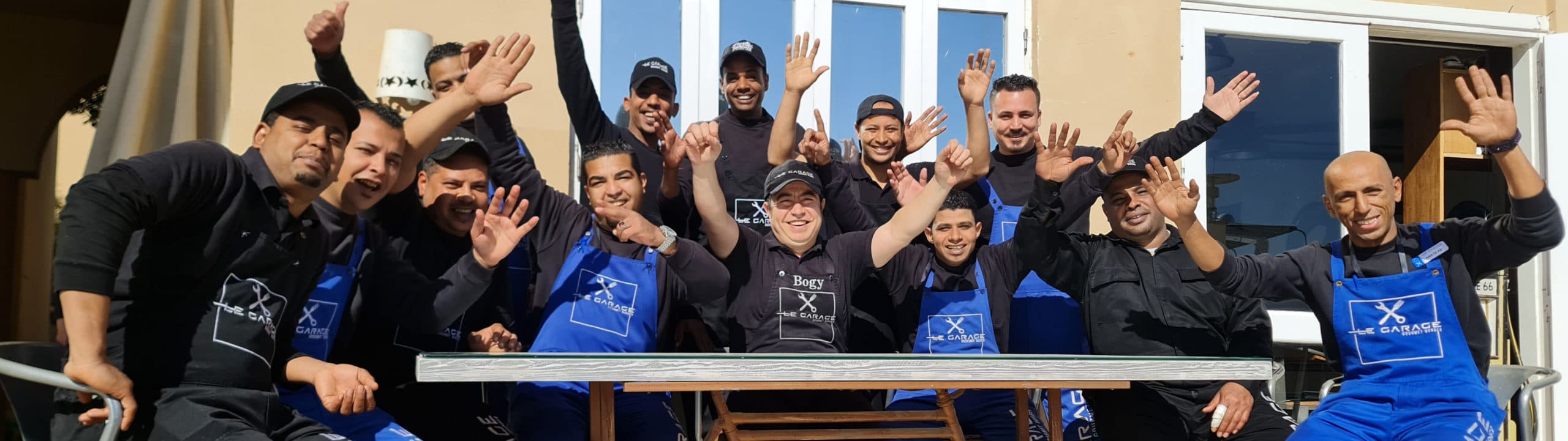 The Le Garage team outside the El Gouna house
